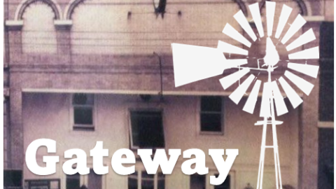 Gateway Theater Logo with windmill, Old Fox theater in the background